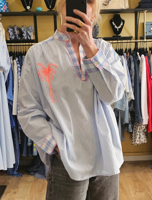 Blouse rayée bleu clair et blanc