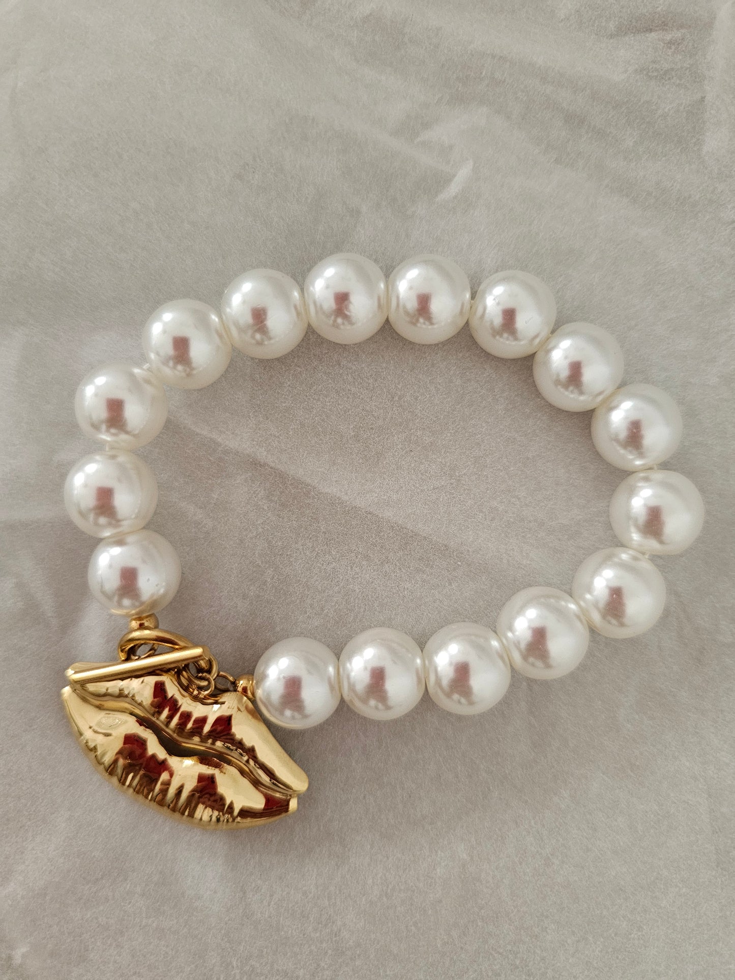 Bracelet grosse perle pendentif bouche