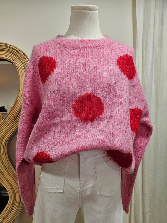 Pull à pois rose et rouge